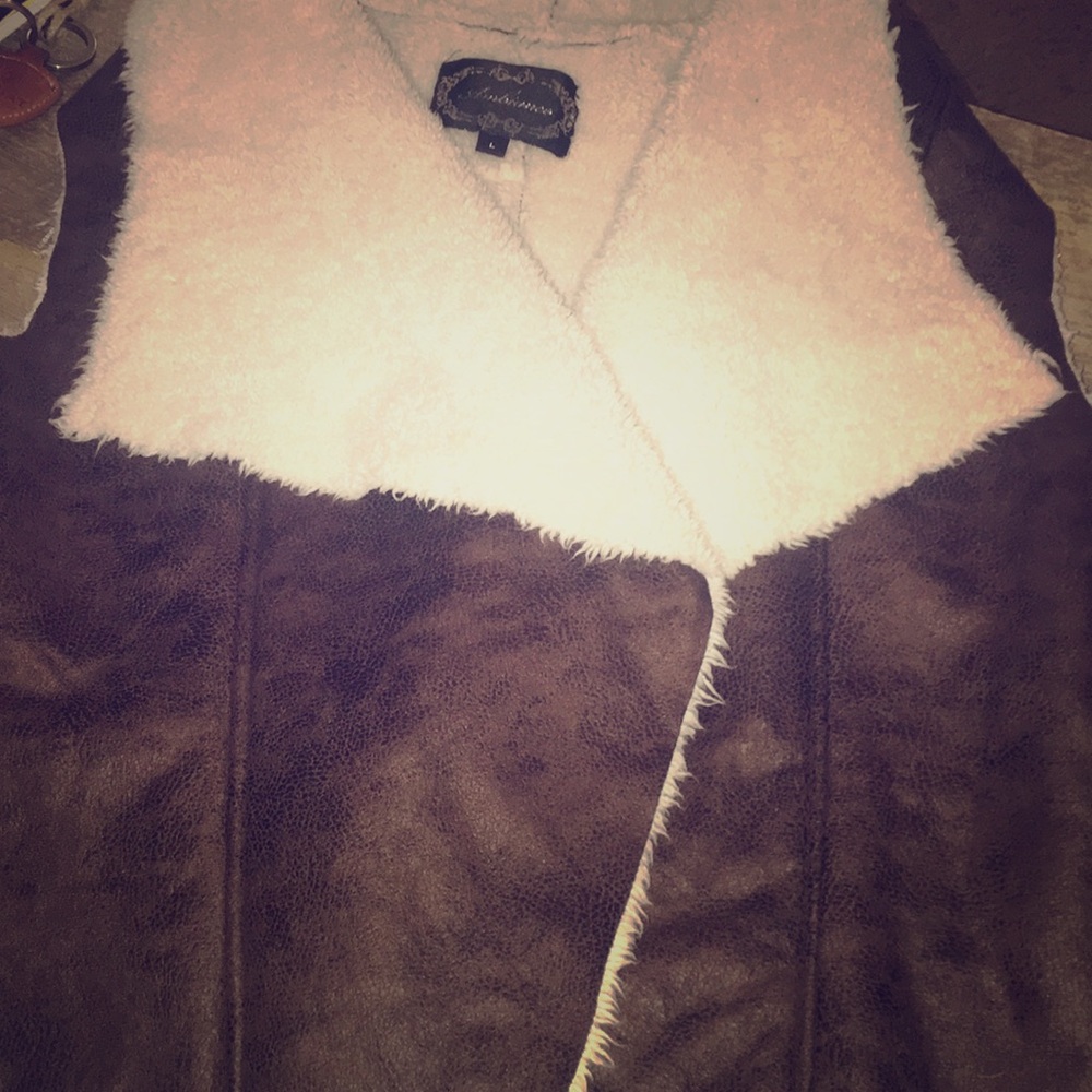 Synthetic cow hide vest